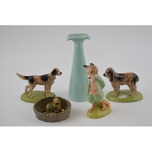 125 - A collection of ceramic items to include Wade Championship series dogs,Wade puppy in basket, John Be... 