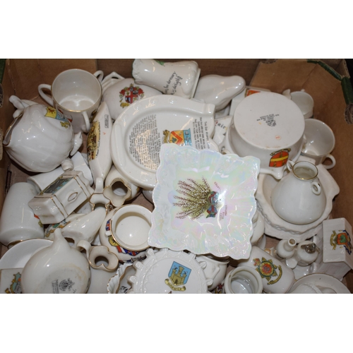 126 - A collection of crested china items to include animals, jugs, vases and varying forms and decoration... 