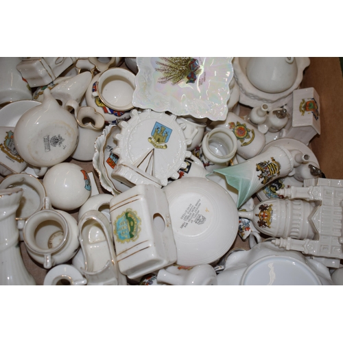 126 - A collection of crested china items to include animals, jugs, vases and varying forms and decoration... 