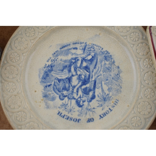 128 - A collection of 19th century ceramics to include blue and white wares and child's plates, religious ... 