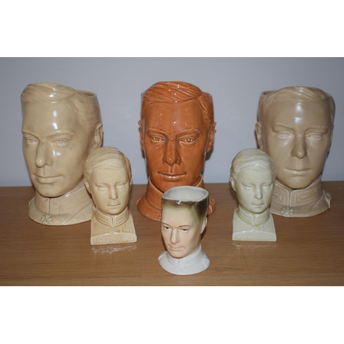 150 - A collection of Bretby commemorative character jugs and busts, in the form of Edward VIII, to includ... 