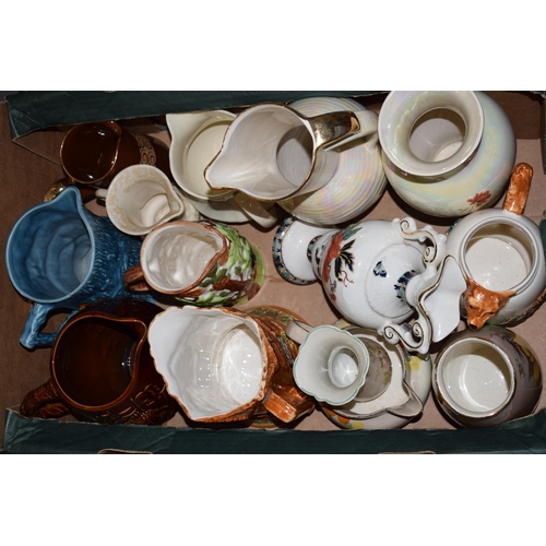 151 - A large collection of pottery to include a Price Kensington bark effect part tea set, Wade jugs, Woo... 