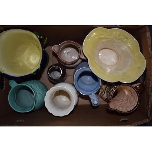 152 - Pottery to include Toby jugs to include a Melba Ware Shylock, Kirkhams, a Goebel bird and jugs / vas... 