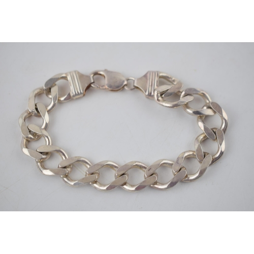 173 - Sterling silver heavy curb link bracelet, 40.0 grams, 22cm.