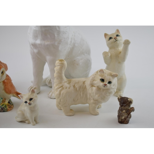 22 - Beswick to include a large and small barn owl, koalas, cats and a large Pererias Cat (8).