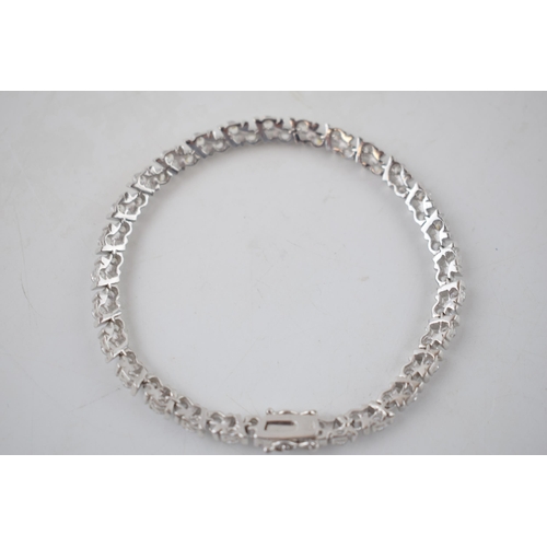 221 - Sterling silver tennis bracelet set with CZs, 17.2 grams, 20.5cm.