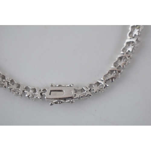 221 - Sterling silver tennis bracelet set with CZs, 17.2 grams, 20.5cm.