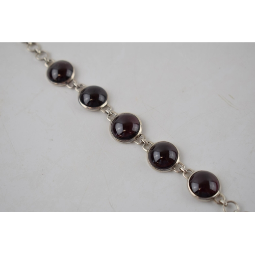 222 - Sterling silver bracelet with polished cabachon style stones, 12.6 grams, 19.5cm.