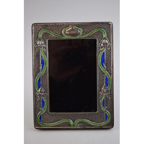 237 - Sterling silver photo frame with easel-back, with Art-Nouveau style enamelled decoration, 19.5cm tal... 