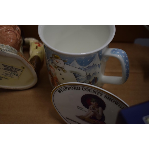 24 - Pottery to include a Beswick Elephant, a Doulton point of sale, a Snowman mug, a foot warmer, Beswic... 