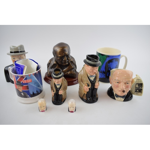 79 - Sir Winston Churchill: a collection of Churchillana collectables to include Royal Doulton Toby jugs,... 