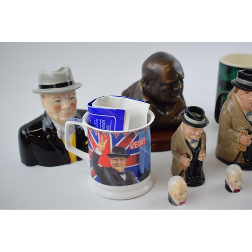 79 - Sir Winston Churchill: a collection of Churchillana collectables to include Royal Doulton Toby jugs,... 