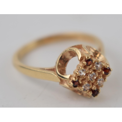 181 - 9ct gold ring set with diamonds and garnets, 3.4 grams, size Q.