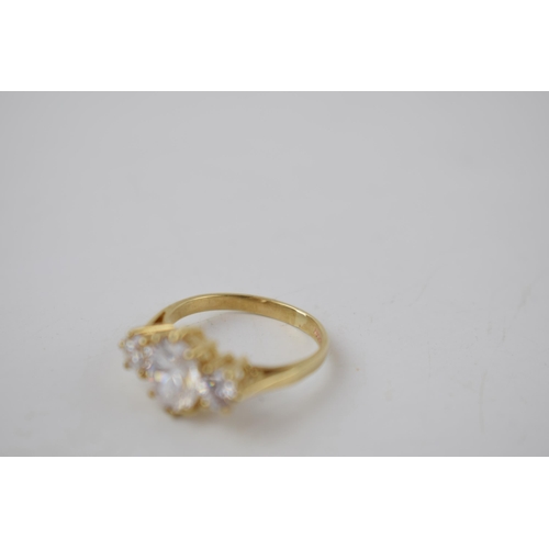 182 - 9ct gold ladies dress ring set with clear stones, 2.5 grams, size K.