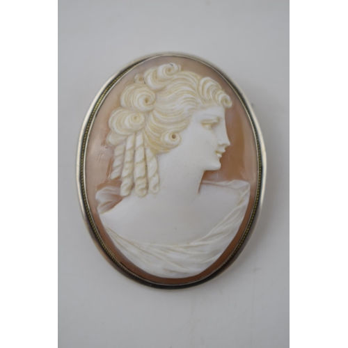 188 - Silver cased cameo of a lady, marked .800, 5.5cm tall, suitable as a pendant or a brooch.