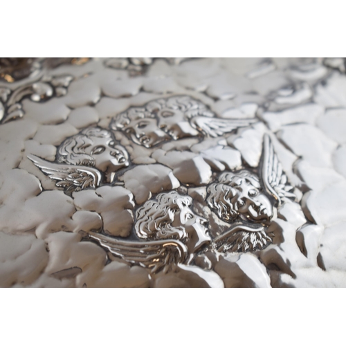 239 - Hallmarked silver tray with shaped edge in the Reynold's Angel pattern, 386.7 grams, Birmingham 1903... 