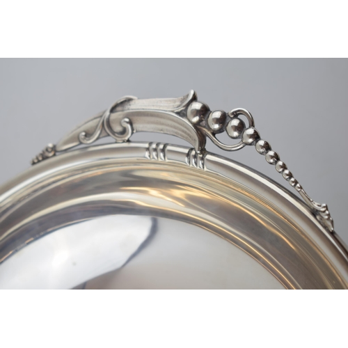 240 - Sterling silver ornate bowl, inspired by Georg Jensen, with stylized handles, stamped 'sterling', 63... 