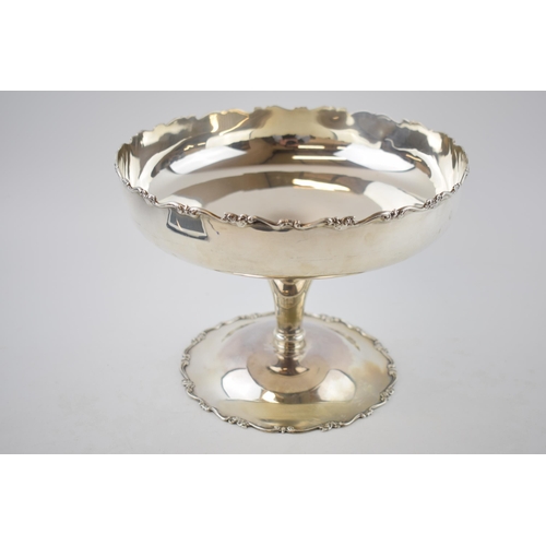 244 - Hallmarked silver large pedestal comport, with floral decoration, Chester 1924, 809 grams.