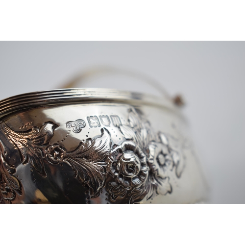 245 - Hallmarked silver basket with swingover handle and repousse decoration, 180.1 grams, London 1907, 15... 