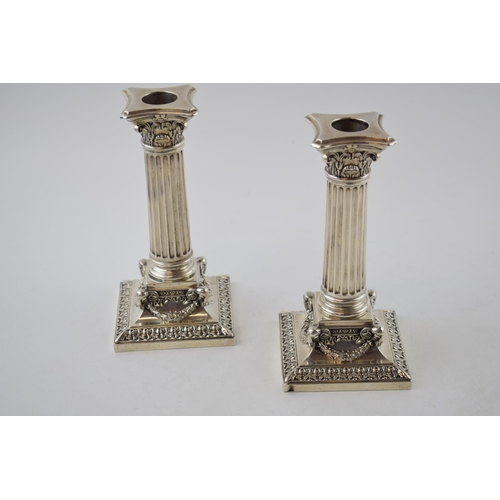 247 - A quality Victorian pair of Corinthian column silver candlesticks, with goat head corners, loaded, g... 