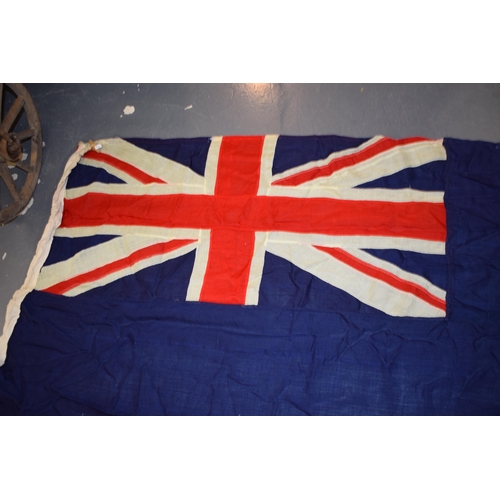 270 - A panel stitched flag with castle motif. 214cm x 95cm.