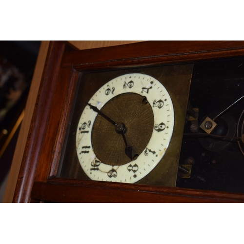 279 - A wall clock with ceramic dial and pendulum movement together with a barometer. (2)