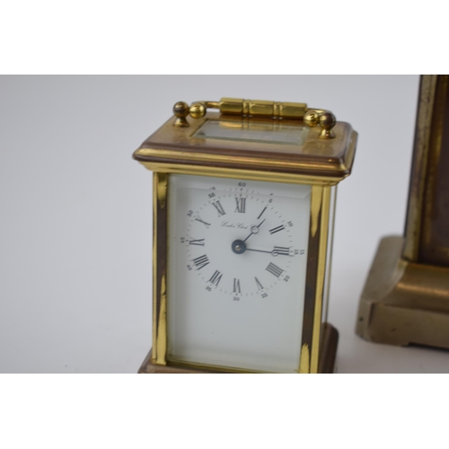 280 - A carriage clock with bevelled glass 'London Clock Co' (height 14.5cm)  together with another simila... 