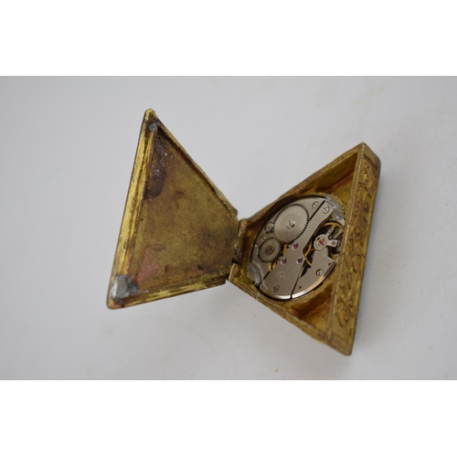 281 - Bronze style Masonic triangular clock, with top wind, 6.5cm tall, in working order.