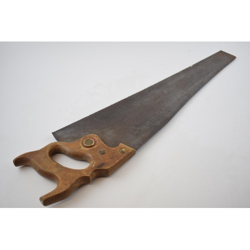 294 - Vintage wooden and metal hand saw with painted 'Tattoos Removed' advertising decor, 66cm wide.