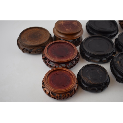 308 - A collection of vintage oriental hardwood bases. (11)