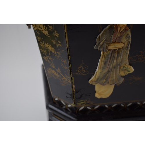 310 - Oriental black lacquered planter on stand with applied figural scenes. Wooden base with tin liner. H... 