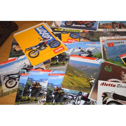 314 - A good collection of new old stock motorcycle dealership brochures from the 1980s and 90s. Brands an... 