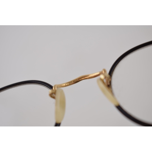 334 - A pair of gentleman's vintage gold plated spectacles Width 11.5cm.