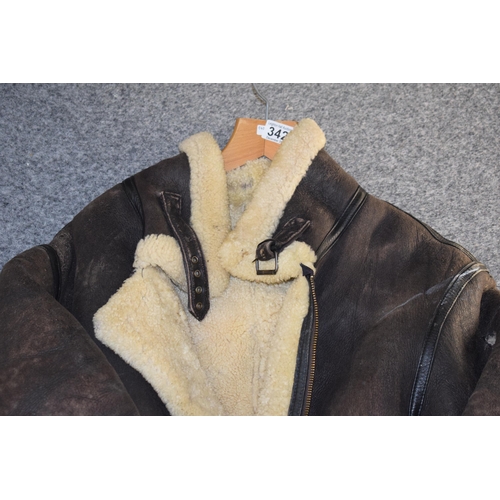 342 - A military style flying jacket with sheepskin lining. Approx size L/XL. Pit to Pit measurement 24