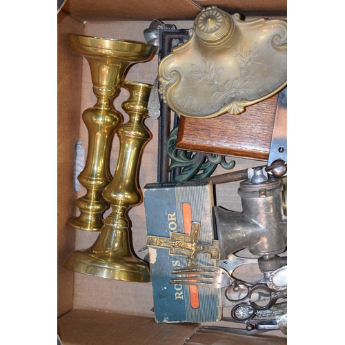 343 - A mixed collection of items to include vintage kitchenalia, brass items candlesticks and other simil... 