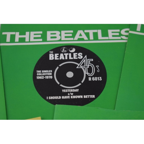 346 - A collection of Beatles 7