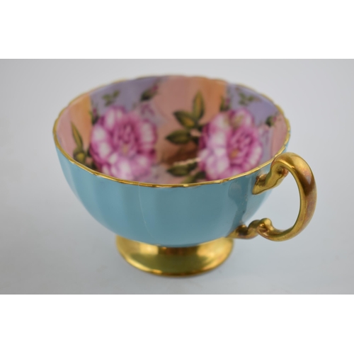 357 - A collection of Aynsley hand painted cups to include an Orchard Goldcup and saucer, another cup with... 