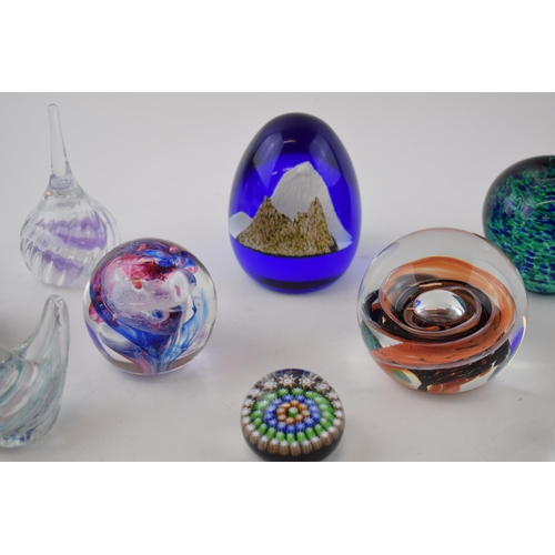 359 - A collection of paperweights to include Caithness such as Everest, Misty, Miniature Ladybird, a mill... 