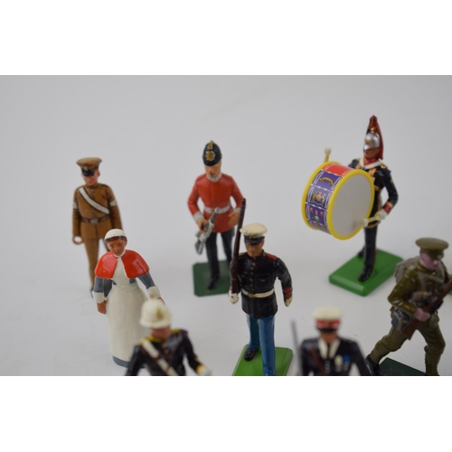 369 - A collection of Britains and similar lead military figures including soldiers, nurses and flag beare... 