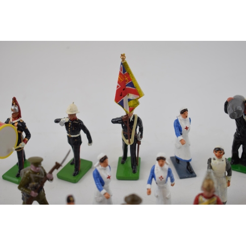 369 - A collection of Britains and similar lead military figures including soldiers, nurses and flag beare... 