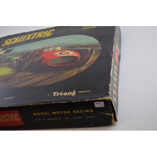 370 - Boxed Tri-ang Scalextric Grand Prix Series track and accessories including cardboard supports for ra... 