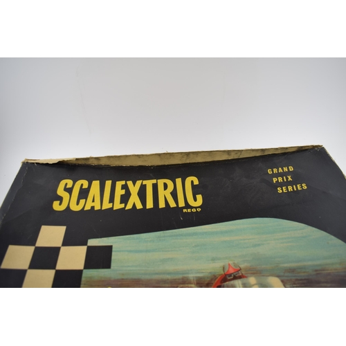 370 - Boxed Tri-ang Scalextric Grand Prix Series track and accessories including cardboard supports for ra... 