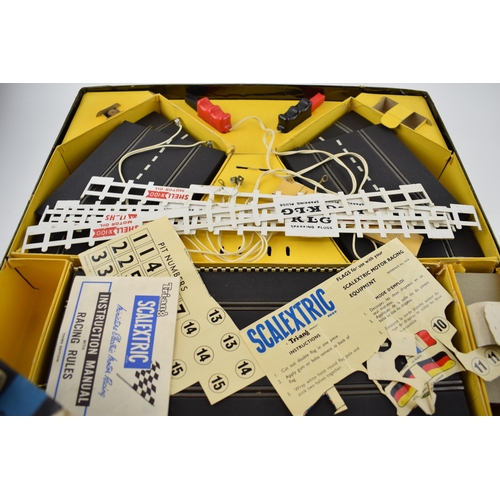 370 - Boxed Tri-ang Scalextric Grand Prix Series track and accessories including cardboard supports for ra... 