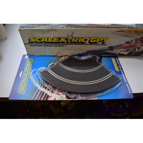 371 - Boxed Scalextric GP1 McLaren vintage toy racing set, both cars are present, one is missing rear spoi... 