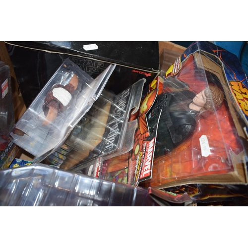 393 - A mixed collection of boxed toys to include Harry Potter, Star Wars and Marvel Universe action figur... 