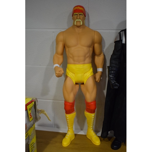 395 - A collection of action figures to include Hulk Hogan, Batman and Darth Vader. Height 82cm. (3)