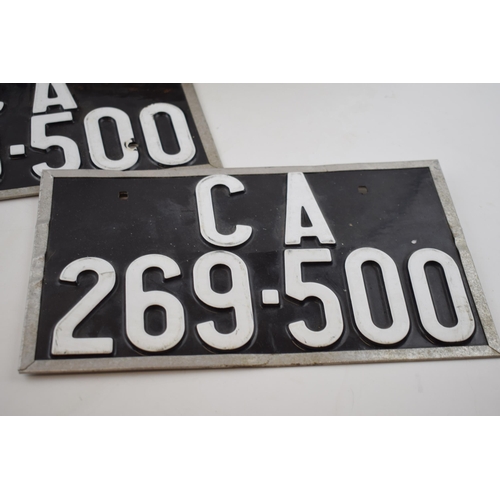 397 - A collection of automobilia items to include a pair of American number plates, a bicycle lamp 'Made ... 