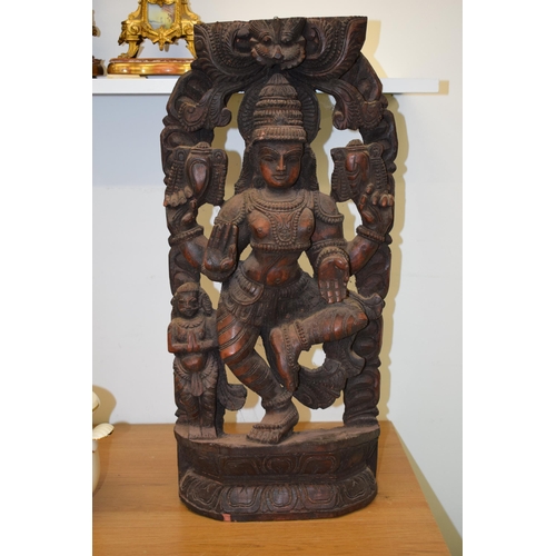 134 - A pottery wall hanging of a Hindu goddess, 62cm tall.