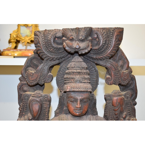 134 - A pottery wall hanging of a Hindu goddess, 62cm tall.