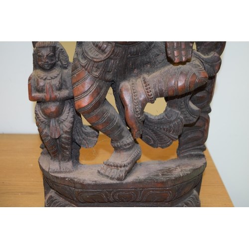 134 - A pottery wall hanging of a Hindu goddess, 62cm tall.